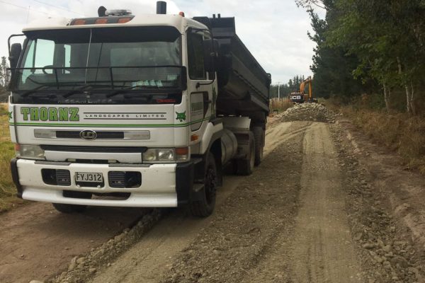 Thornz Landscapes On Site With 11 Ton Tip Trailer And Excavator Preparing Driveway