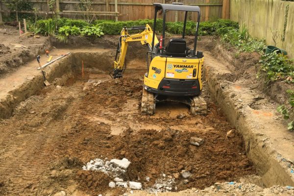 Excavator On Site Digging Deep Foundation Preparing For Piles Thornz Landscapes North Canterbury