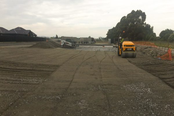 Roller Smoothing Surface In Preparation For Resurfacing Thornz Landscapes