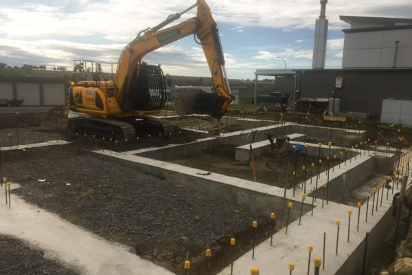 Thornz Landscapes Excavator On Site Preparing for Concrete Foundation Pour