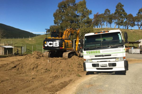 Thornz Landscapes Truck And Excavator On Rural Site Clearing Land And Preparing For Driveway Construction