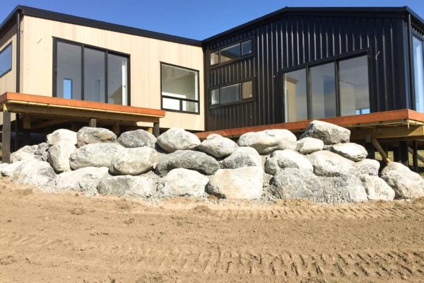 Large Rocks Laid For Landscape Patio Architecture On New Build