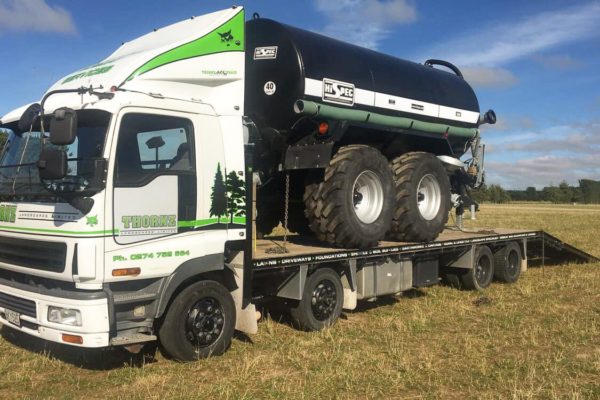 Thornz Landscapes Truck Transporting Large Machinery Water Cart