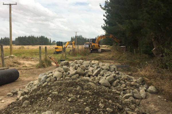 Large Rock And Dirt Material Tipped And Ready For Excavator To Spread To Stabilise Rural Driveway Job