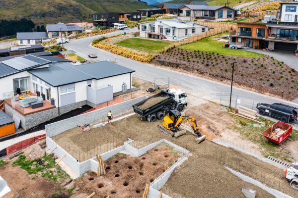 Thornz Landscapes On Site Filling Retaining Wall With Material To Prepare For Foundation On A Hill House Build